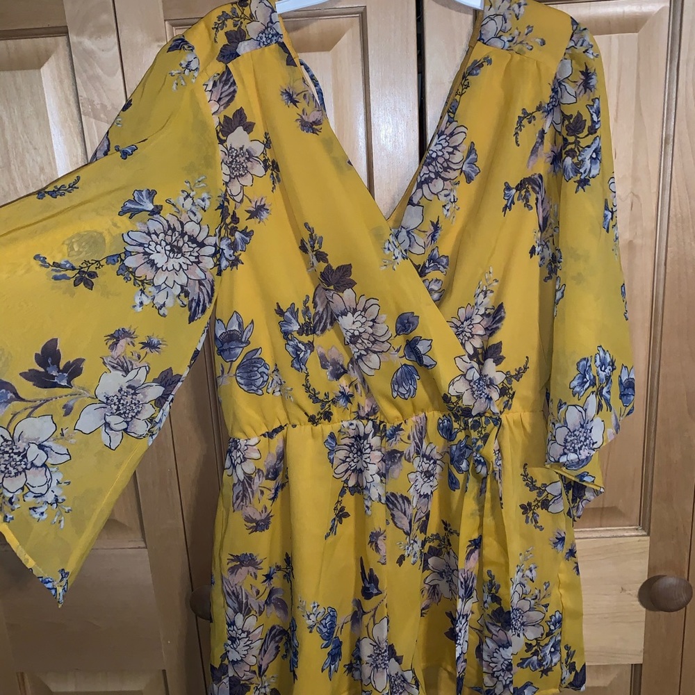 Cute Yellow romper with flowers never worn